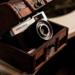 retro photo camera in classic chest